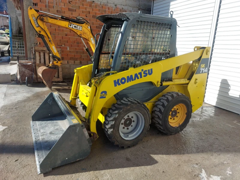 Мини челни товарачи Komatsu SK714, снимка 1 - Индустриална техника - 48858080