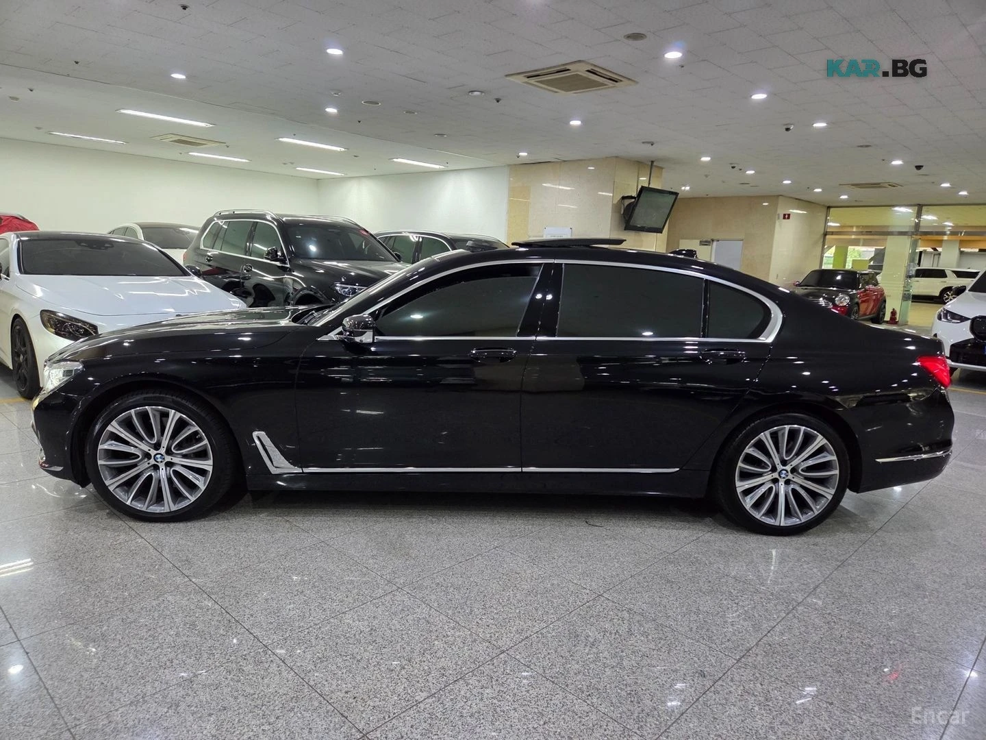 BMW 750 Li xDrive* HUD* 360* МОНИТОРИ* МАСАЖИ* ТАБЛЕТ, снимка 2 - Автомобили и джипове - 56006914