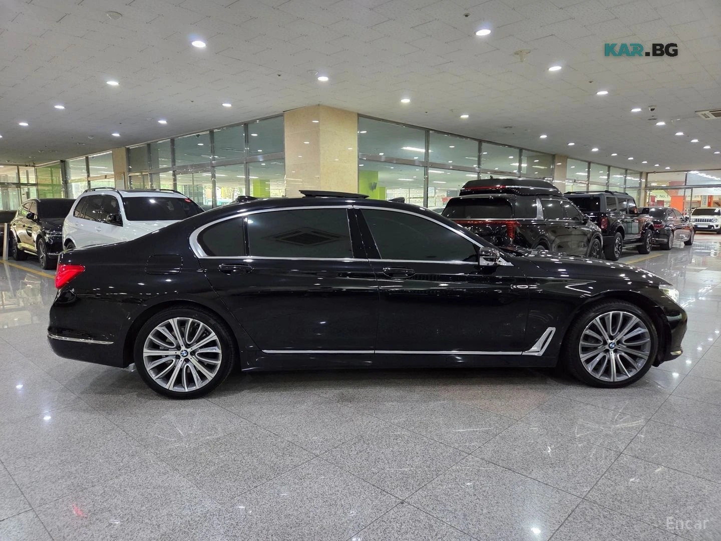 BMW 750 Li xDrive* HUD* 360* МОНИТОРИ* МАСАЖИ* ТАБЛЕТ, снимка 4 - Автомобили и джипове - 56006914