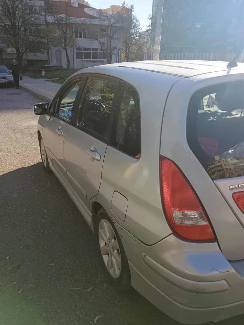 Suzuki Liana, снимка 2 - Автомобили и джипове - 52297212