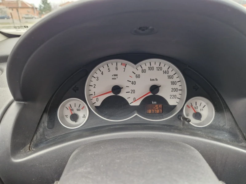 Opel Corsa 1.2 / 80 к.с. климатик , снимка 14 - Автомобили и джипове - 49543246