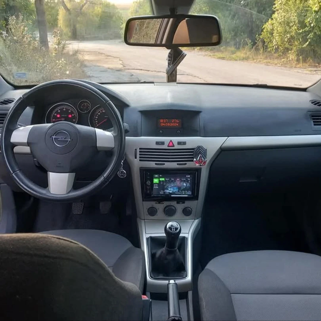 Opel Astra, снимка 13 - Автомобили и джипове - 55807275