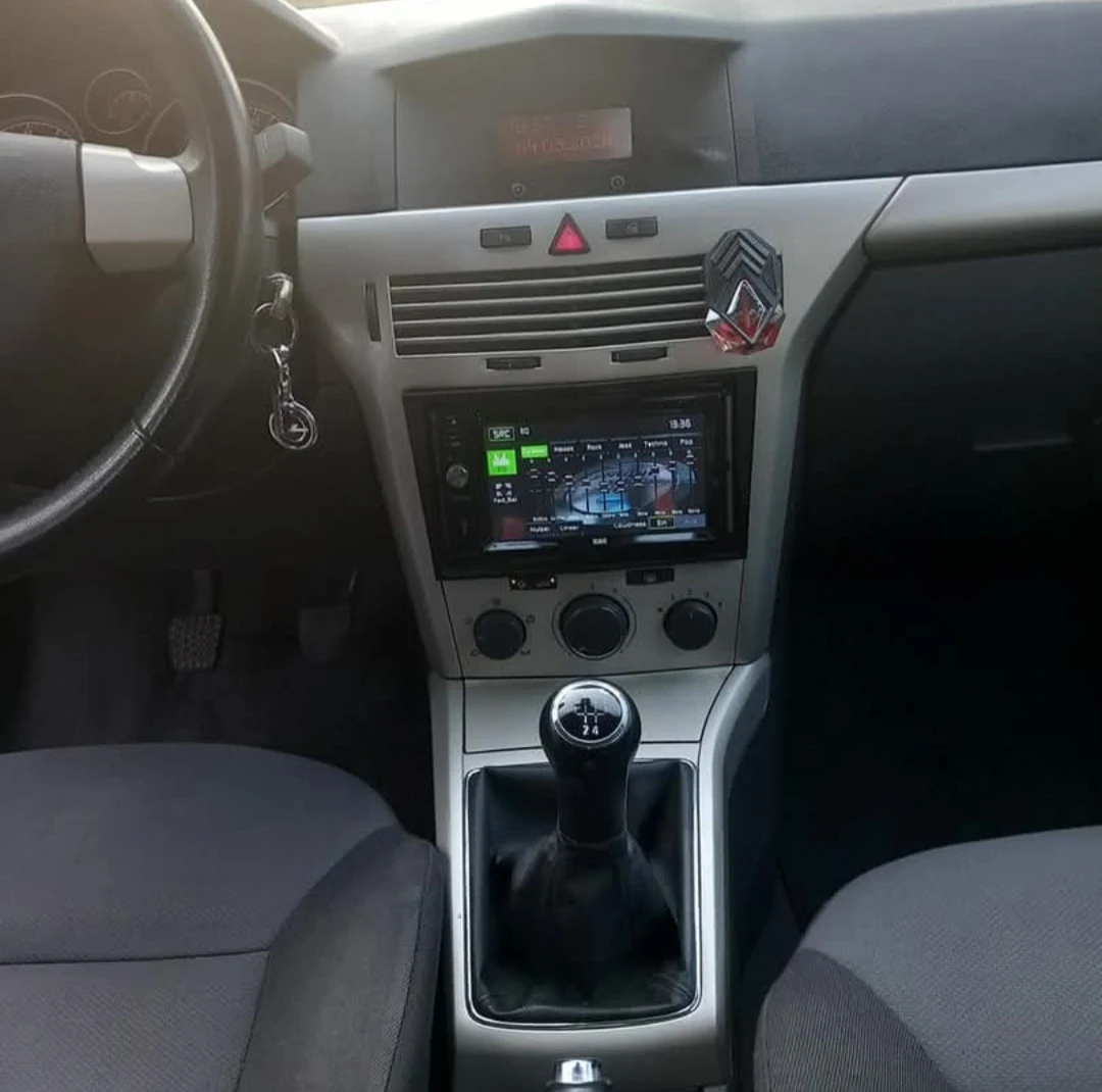 Opel Astra, снимка 9 - Автомобили и джипове - 55807275