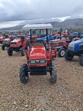 Трактор Kubota скайтрак 