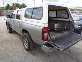     Nissan Navara 2.5 133  