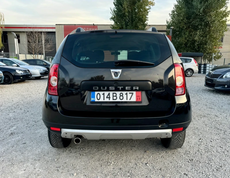 Dacia Duster 1.6i -- ТОП СЪСТОЯНИЕ  , снимка 4 - Автомобили и джипове - 47711641