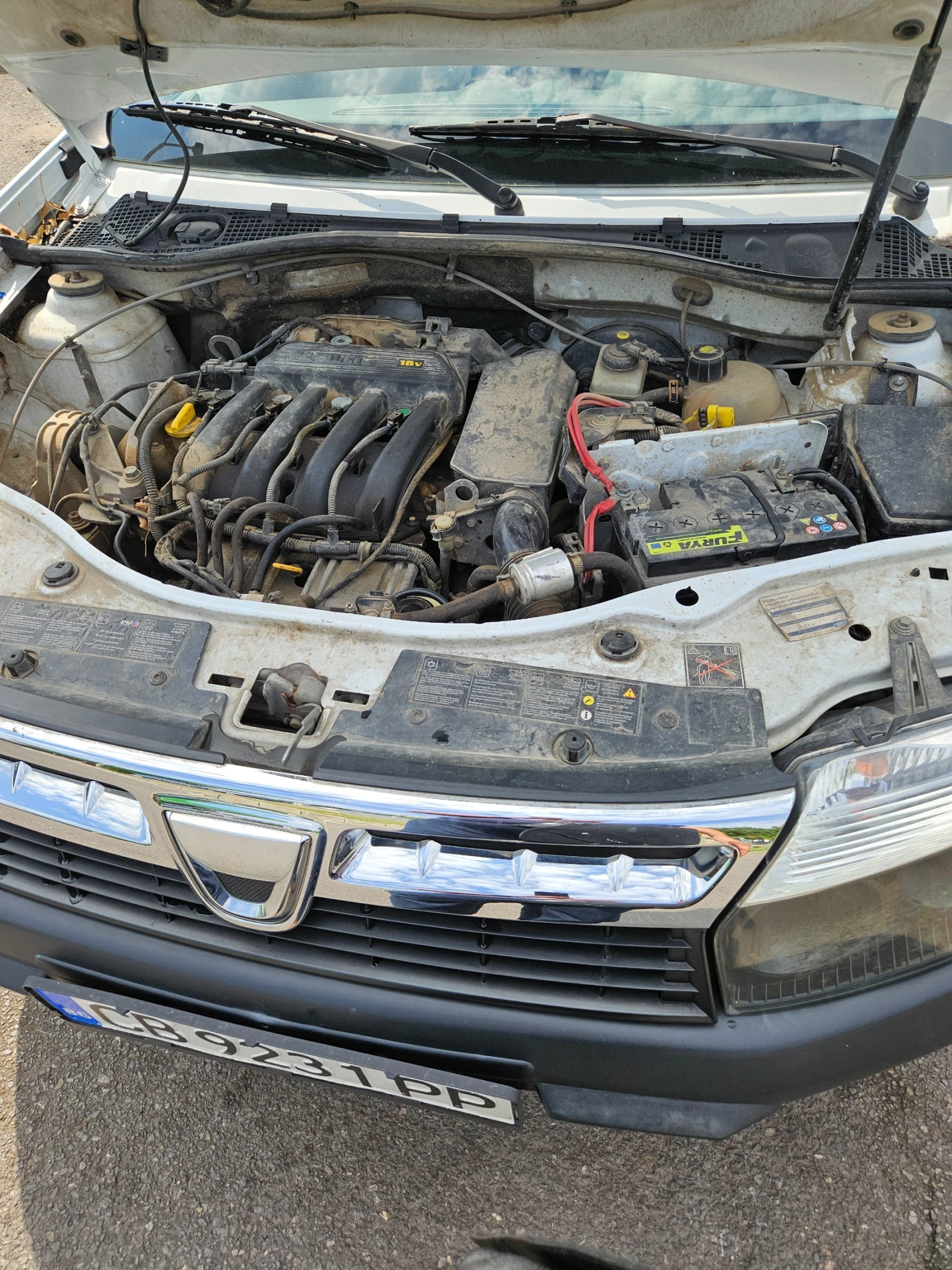 Dacia Duster 1.6i 4x4, снимка 7 - Автомобили и джипове - 55651500