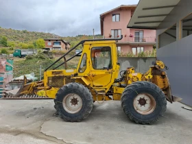 Специализирани машини Машини за дърводобив HSM 704, снимка 1