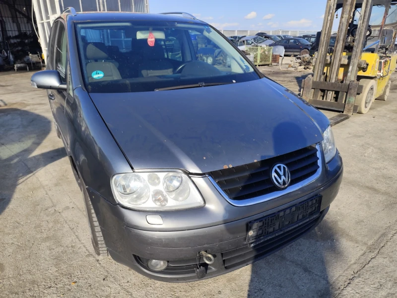 VW Touran 2.0TDI - BKD, снимка 2 - Автомобили и джипове - 52077861