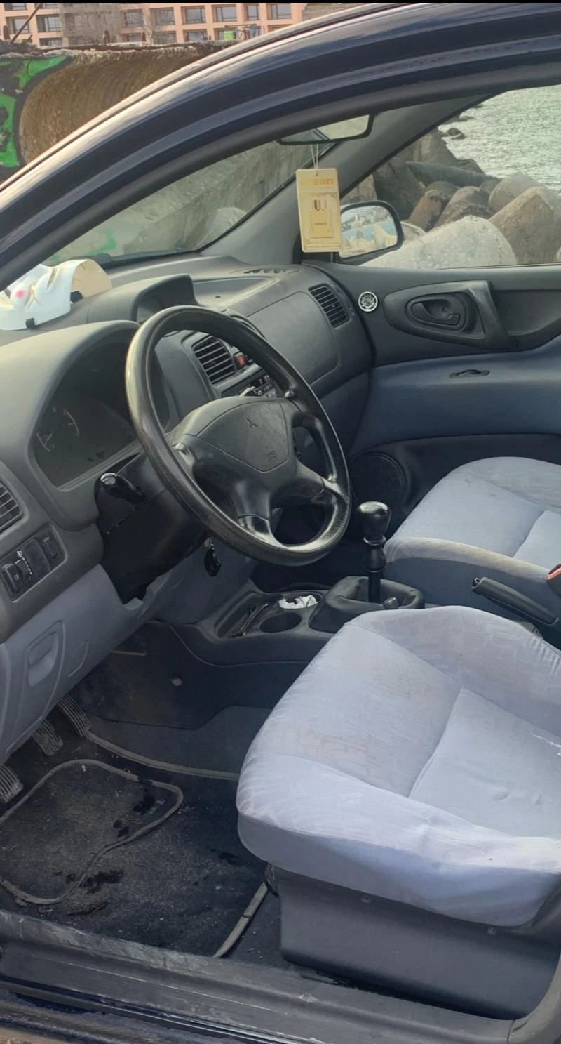 Mitsubishi Space star, снимка 13 - Автомобили и джипове - 53129611