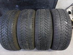 Гуми Зимни 215/65R16, снимка 1 - Гуми и джанти - 39382036