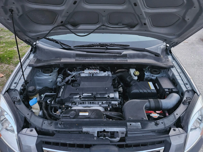 Kia Sportage 2.0GPL, снимка 13 - Автомобили и джипове - 52682408