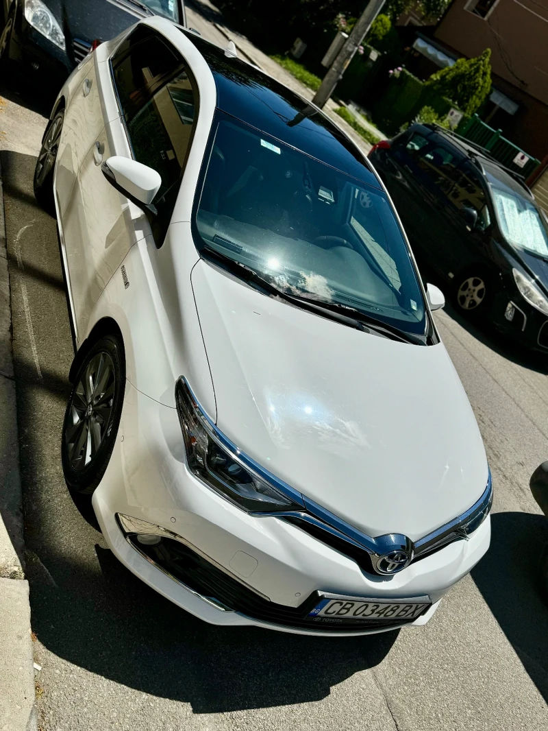 Toyota Auris 1.8 Hybrid, снимка 12 - Автомобили и джипове - 48399793