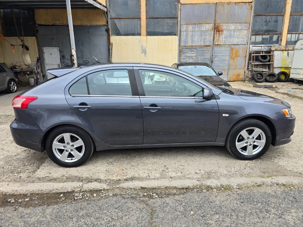Mitsubishi Lancer 1.5, снимка 9 - Автомобили и джипове - 54812053