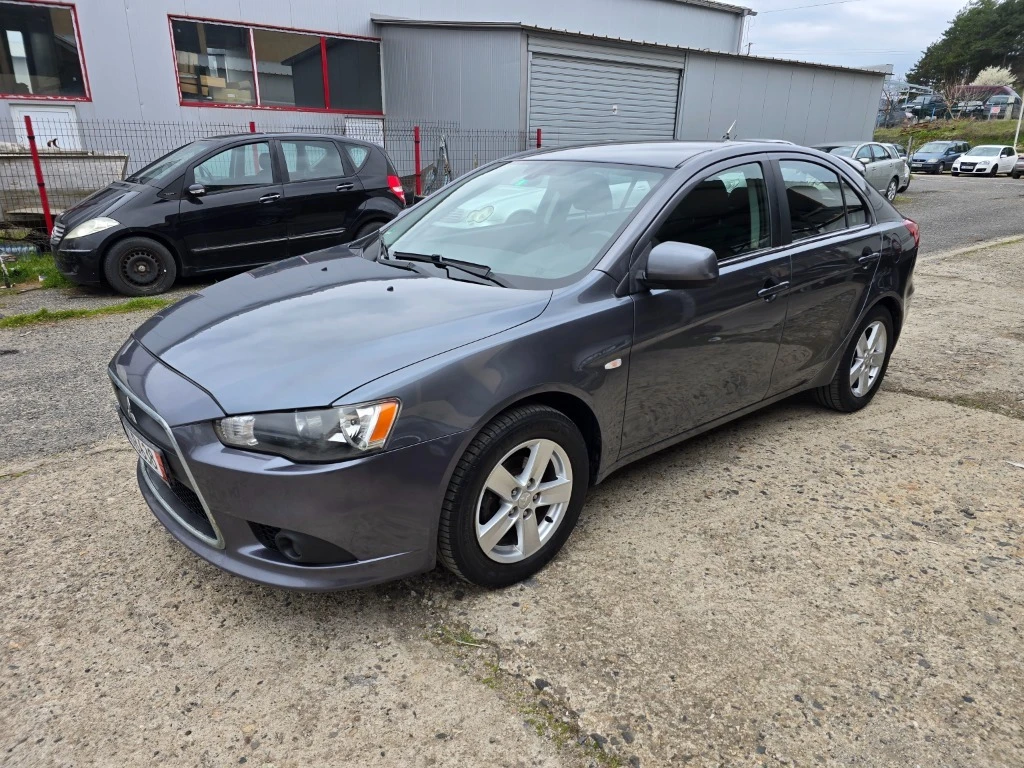 Mitsubishi Lancer 1.5, снимка 8 - Автомобили и джипове - 54812053