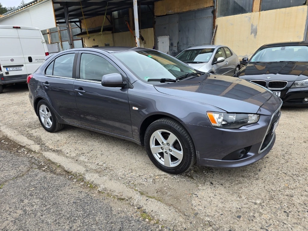 Mitsubishi Lancer 1.5, снимка 12 - Автомобили и джипове - 54812053