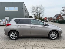 Toyota Auris 1.6i Comfort - 11400 € / 22296.46 лв. - 90459773 2