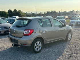 Dacia Sandero 1.5-90кс, AC - 8999 лв. - 86163211 4