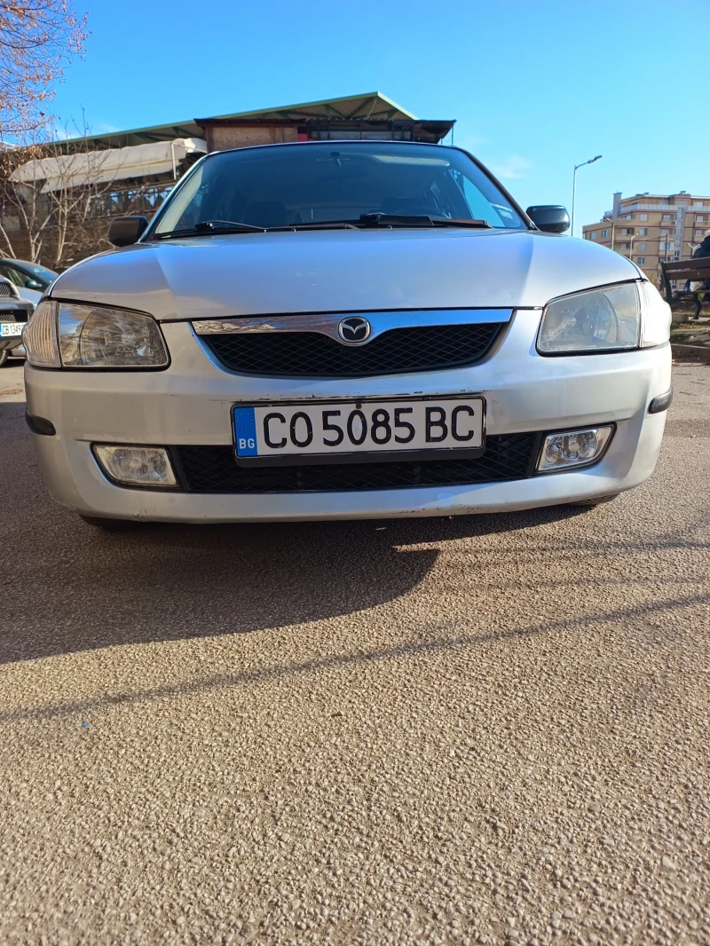 Mazda 323, снимка 1 - Автомобили и джипове - 49387911