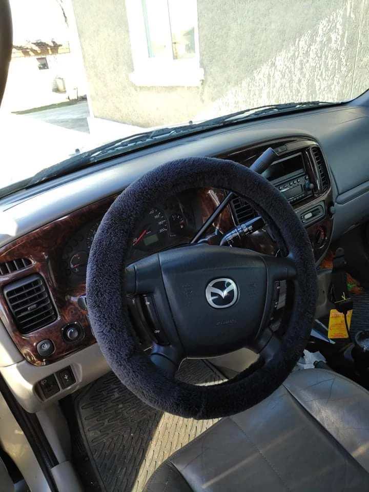 Mazda Tribute, снимка 8 - Автомобили и джипове - 47601893