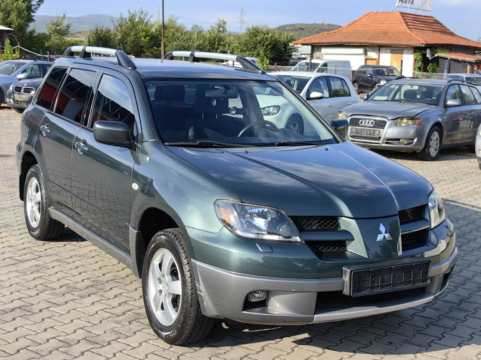 Mitsubishi Outlander 2.4i 4х4 105000км - изображение 8