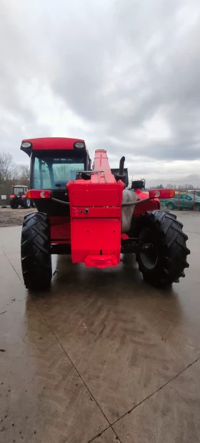 Телескопичен товарач Manitou MT734, снимка 7