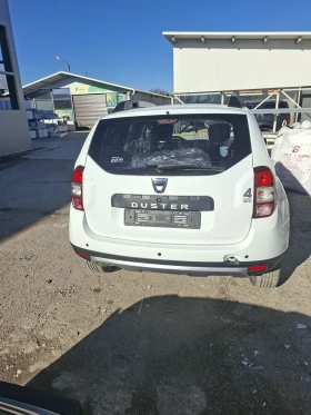 Dacia Duster 1.6i 4x4  - 8999 € / 17600.51 лв. - 12450277 4