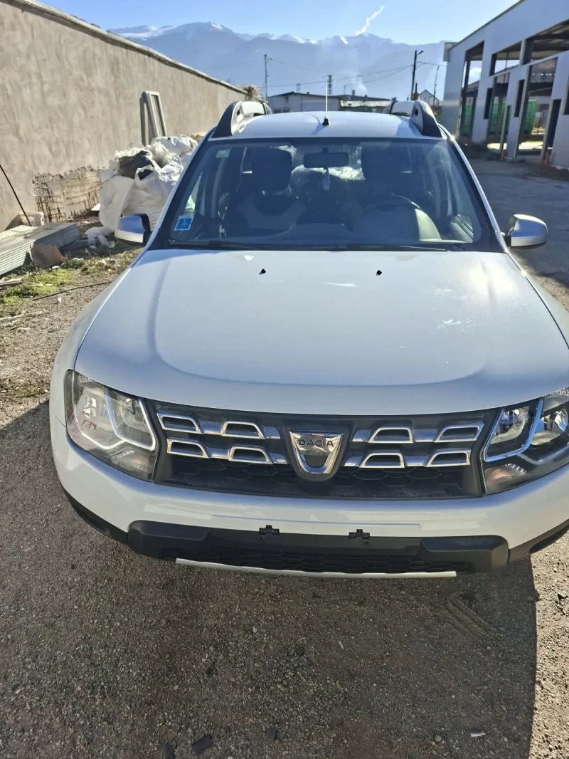 Dacia Duster 1.6i 4x4 , снимка 2 - Автомобили и джипове - 52935277