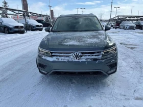 VW Tiguan HIGHLINE/CARFAX/ПОДГЕВ/ПАНО/ДИГ.КМ./КЛИП/+ ГУМИ, снимка 2