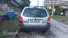 Mazda Tribute, снимка 10