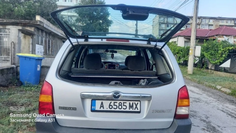 Mazda Tribute, снимка 8 - Автомобили и джипове - 46753335