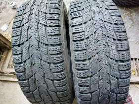 Гуми Зимни 215/65R15, снимка 1 - Гуми и джанти - 39109109