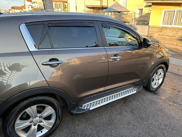 Kia Sportage, снимка 16 - Автомобили и джипове - 49549096