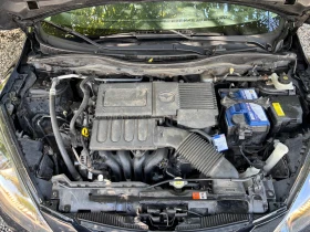 Mazda 2 1.4i, снимка 17