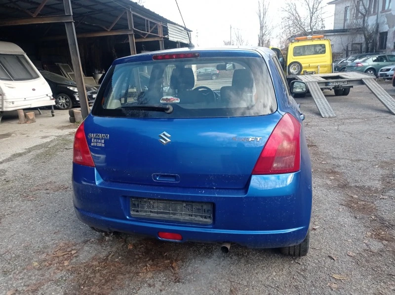 Suzuki Swift 1.3, снимка 11 - Автомобили и джипове - 46668198