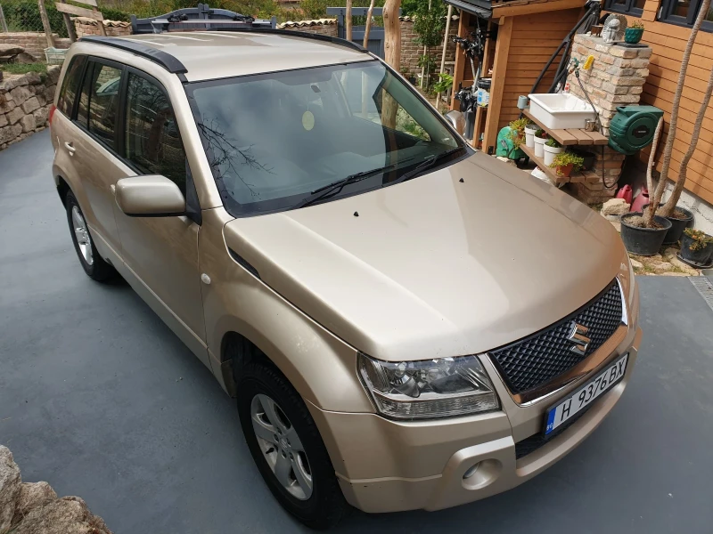 Suzuki Grand vitara 2.0i, снимка 5 - Автомобили и джипове - 51845657
