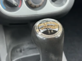 Opel Corsa 1.2 Газ, снимка 11
