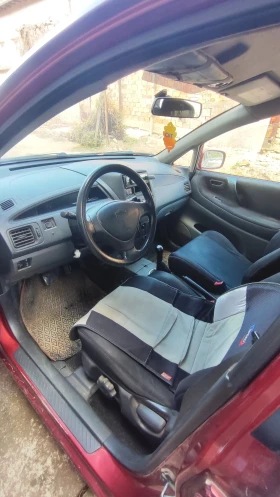 Suzuki Liana 1.6i с газ, снимка 9