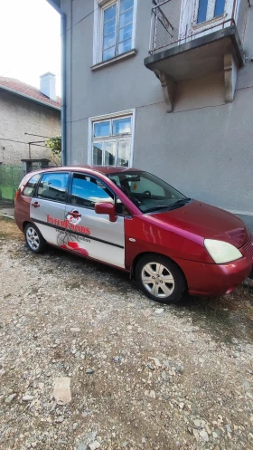 Suzuki Liana 1.6i с газ, снимка 15