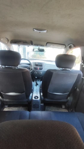 Suzuki Liana 1.6i с газ, снимка 11