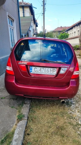 Suzuki Liana 1.6i с газ, снимка 13