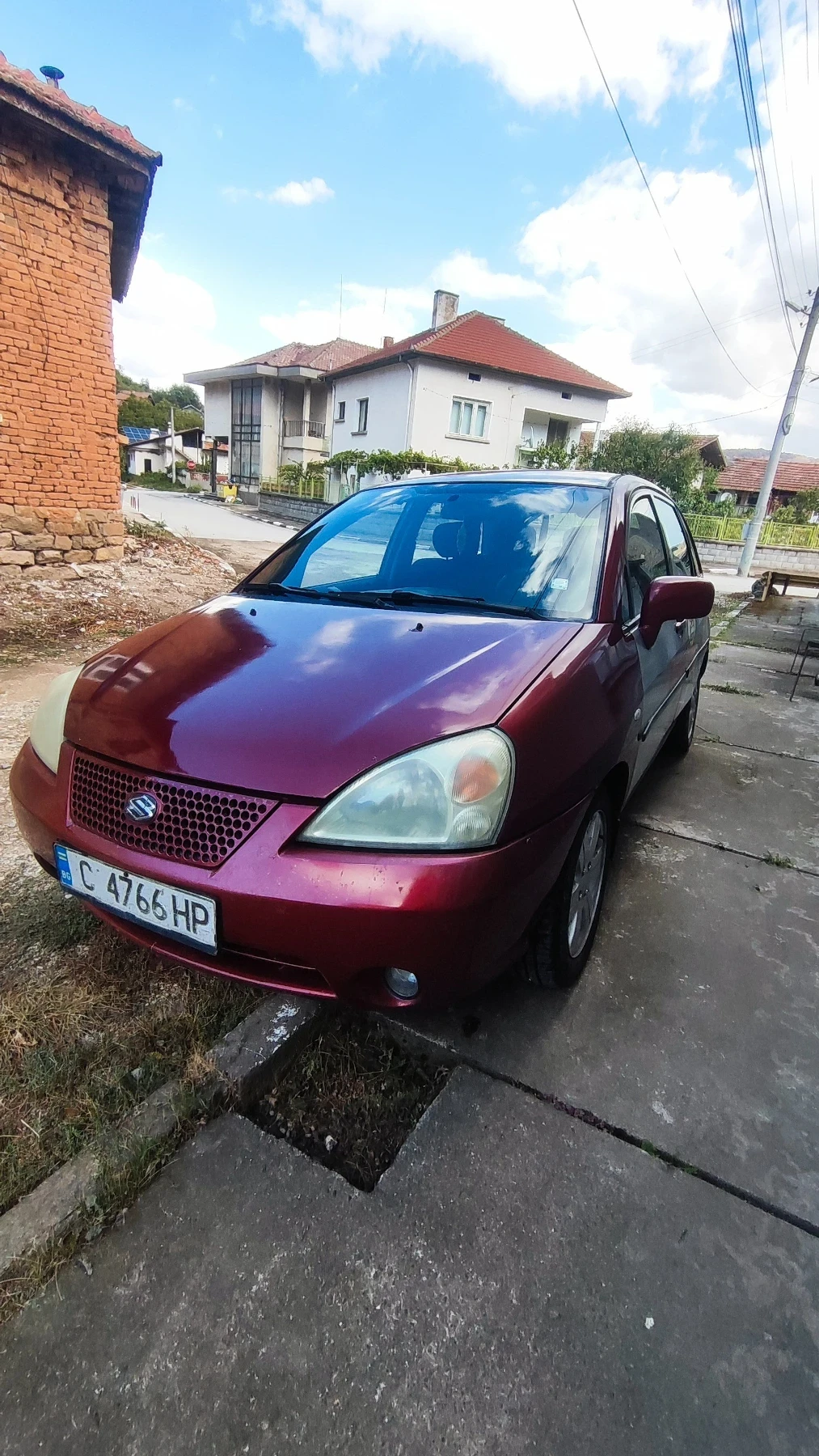 Suzuki Liana 1.6i с газ, снимка 16 - Автомобили и джипове - 56246461