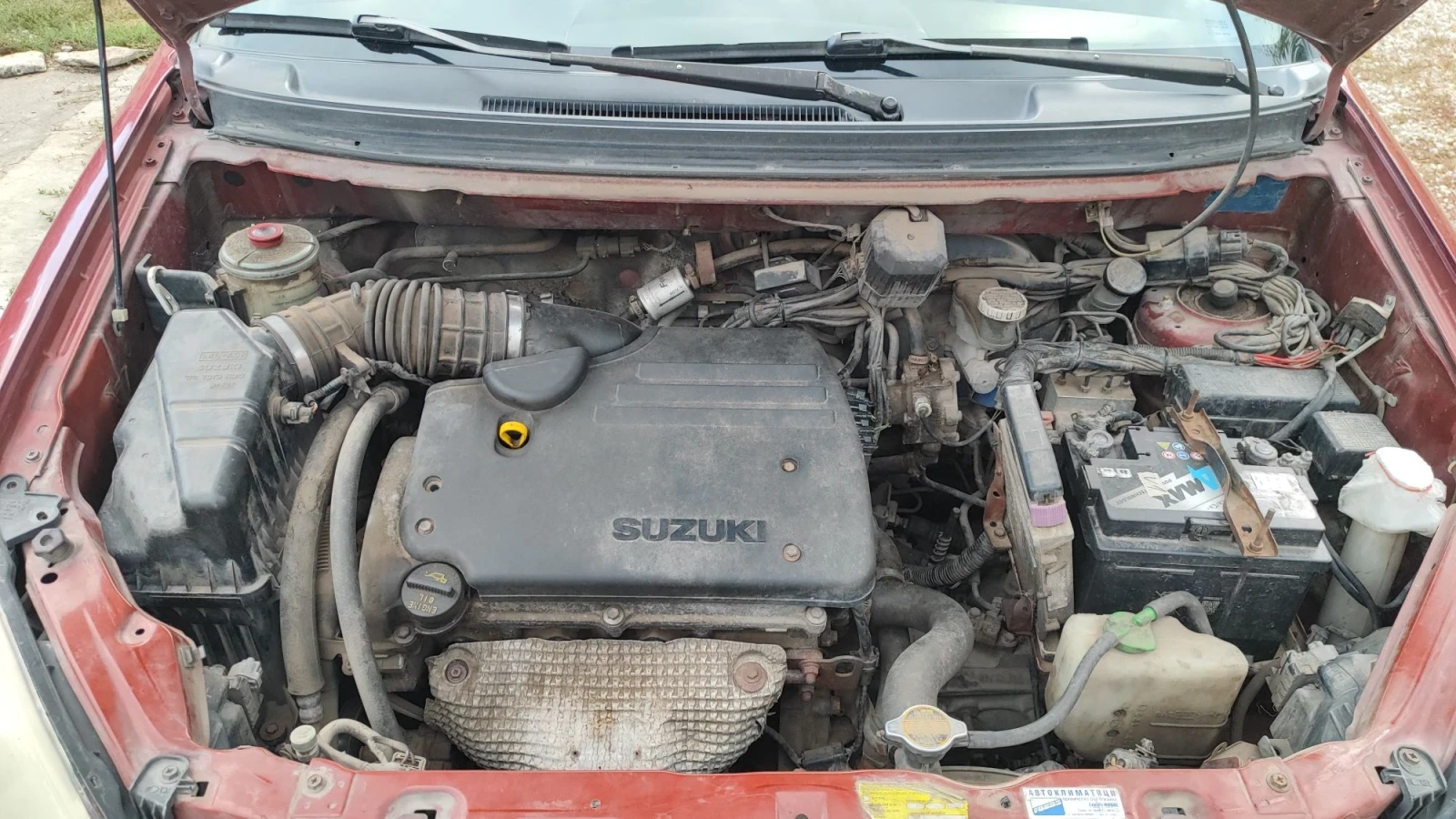 Suzuki Liana 1.6i с газ, снимка 8 - Автомобили и джипове - 56246461