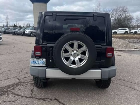 Jeep Wrangler * SAHARA * ПОДГРЕВ / КОЖЕН САЛОН / КЛИП НА МОТОРА - 14890 € / 29122.31 лв. - 68663029 4