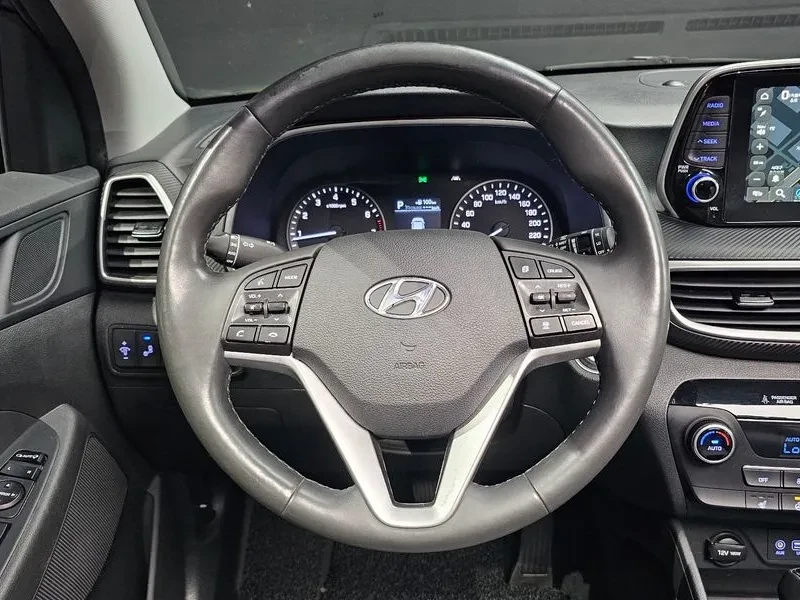 Hyundai Tucson 1.6 Turbo 4Wd Modern, снимка 12 - Автомобили и джипове - 55616004