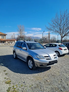 Mitsubishi Outlander 2.4i GpL 4x4 | Mobile.bg    2