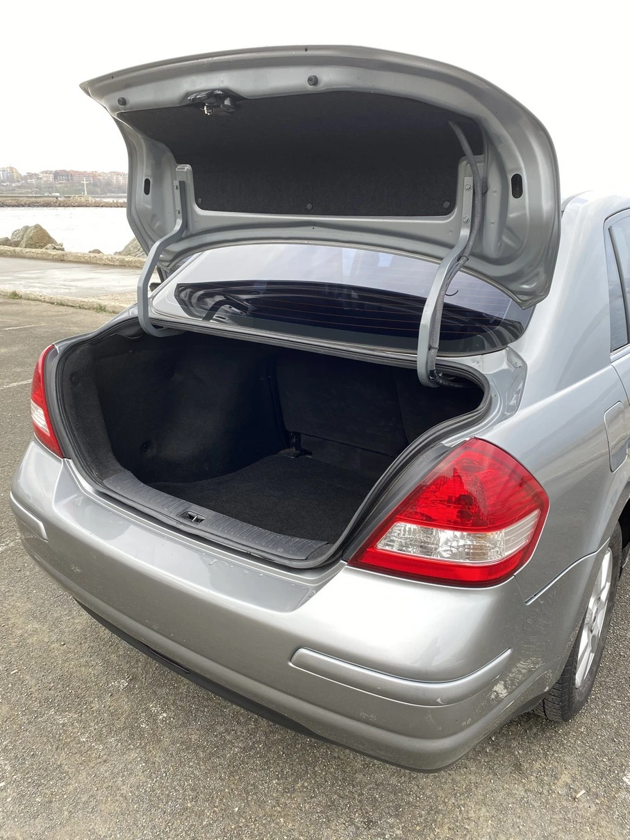 Nissan Tiida  - изображение 7