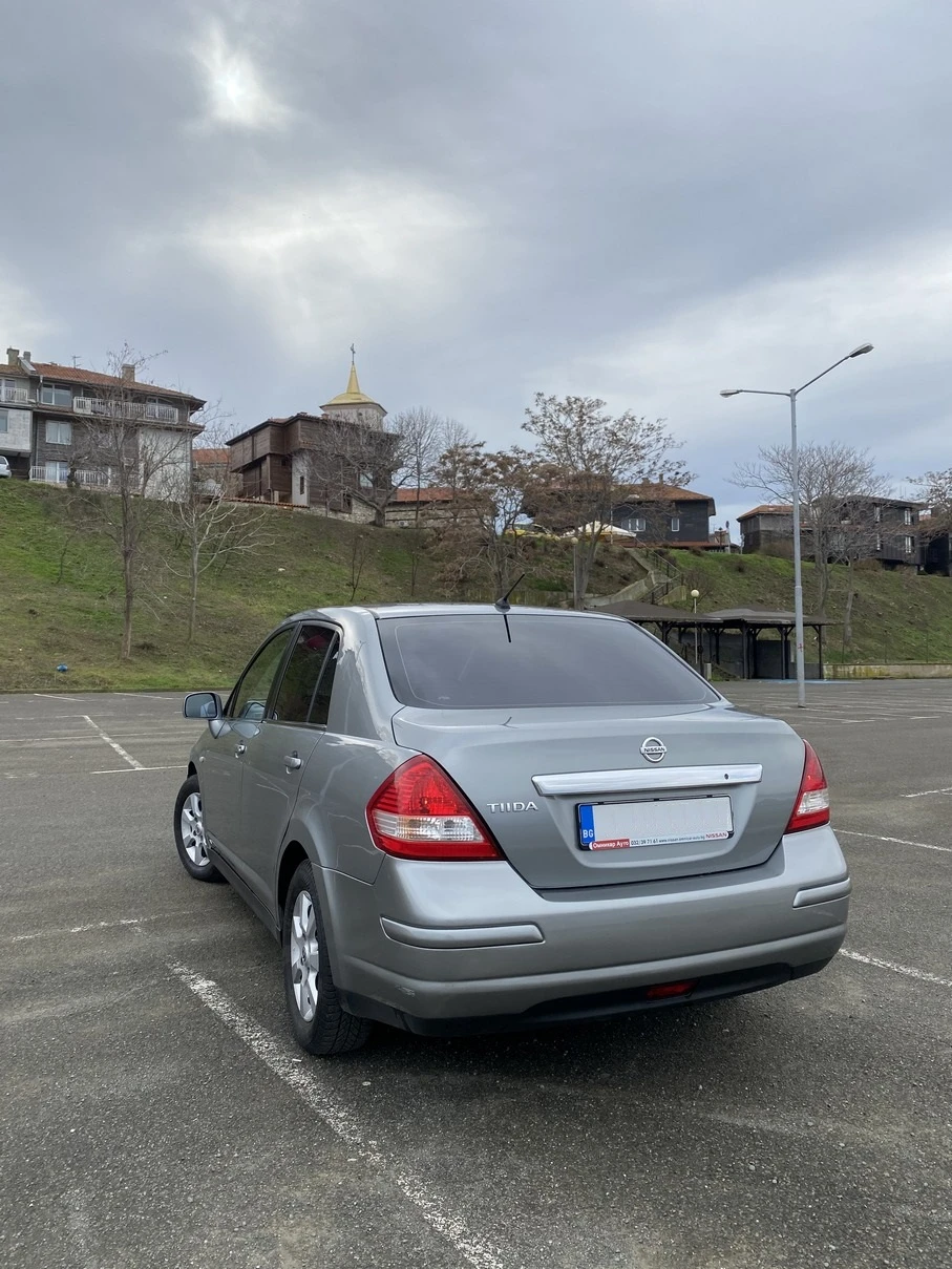 Nissan Tiida  - изображение 5