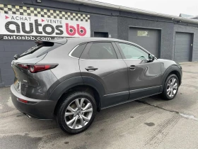 Mazda CX-30 ПОДГРЕВ* КАМЕРА* ШИБИДАХ* МЪРТВА ТОЧКА* КЕЙЛЕС - 29700 лв. / 15185.37 € - 56501228 4