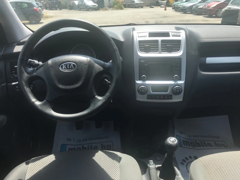 Kia Sportage 2.0ЧИСТО НОВ ГАЗ-БЕНЗИН 4по4, снимка 12 - Автомобили и джипове - 46383635